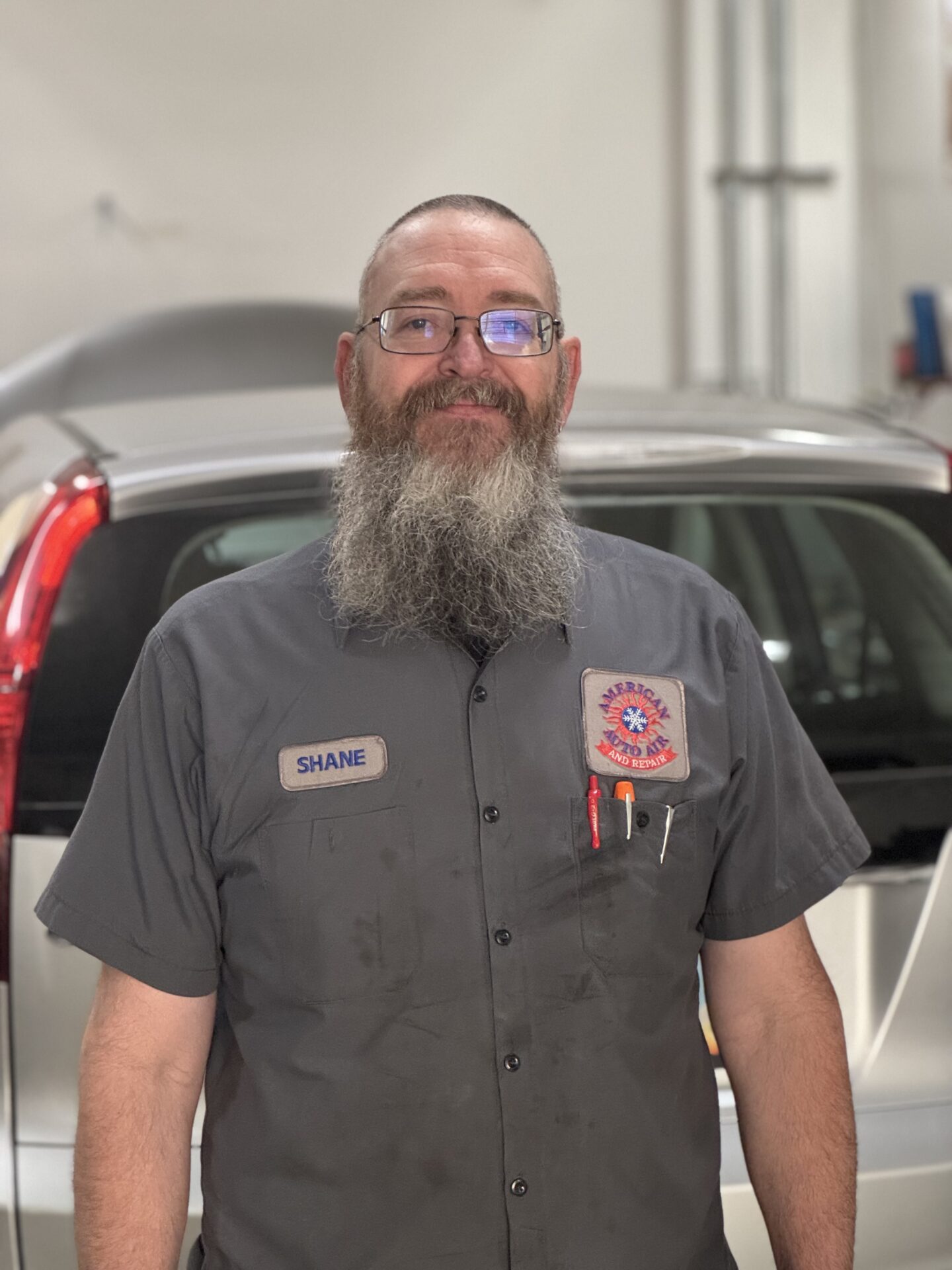 Shane serves as an automotive technician at American Auto Air and Repair. | auto mechanics near me.