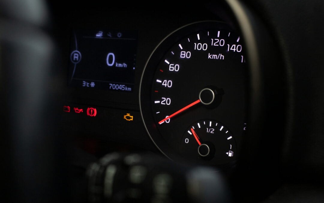 Check engine light on car dashboard indicating a need for engine repair near me