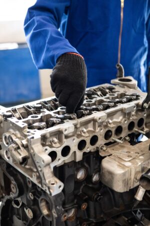 Mechanic performing engine block repairs for auto repair Reno NV customers